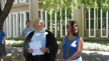 Carol Mitchell receiving Department citation from Dr. Russell