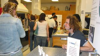 Lyle Farrell helps at “Guess the Smell”