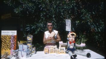 Woman with dairy products, Picnic Day April 1961
